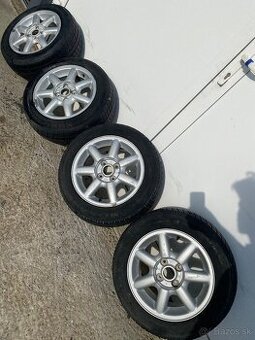 Disky VW Polo Vento Golf III  4x100 + zimné pneu 185/60R14