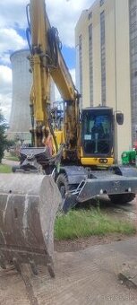 Postúpenie leasingu komatsu PW158 + steelwrist