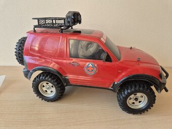 RC modely Tamiya Porsche / Mitsubishi 1/10