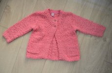 ružový sveter