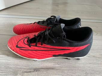 Vysoke nepremokave Lotto a kopacky Nike