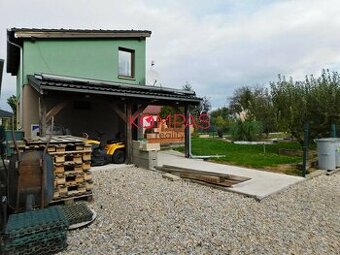 DOM SO ZÁHRADOU, DREVENÝM PRÍSTREŠKOM A PARKOVANÍM V OBCI LU