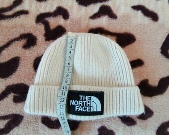 Krémová zimná čiapka The North face, vhodná pre veľ. S/M, ži