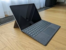 Microsoft Surface Pro 8 with keyboard and mouse