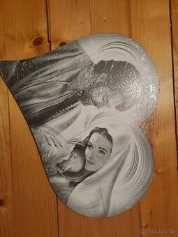 Obraz svätej rodiny maľovaný na dreve.