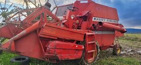 Obilny kombajn massey ferguson 206