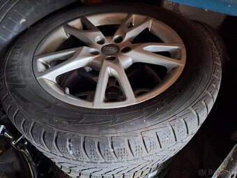 zimné Goodyear 235/55 R18 104H
