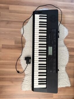 Klávesy so stojanom značky Casio