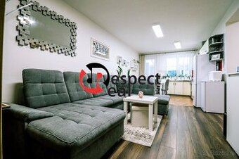 Elegantný 2-izbový byt s pozemkom a s parkovacím státím s mo