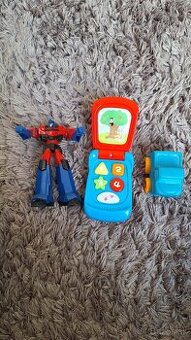 3 hračky panáčik transformers,autíčko a hraci mobil