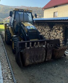 Zemné a výkopové práce s Traktorbagrom CAT