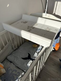 Prebaľovacia podložka na postieľku