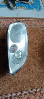 Predam svetlomet VW Touran 2006 L a. P