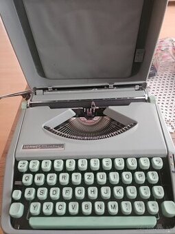 Kufrikovy pisaci stroj Hermes Baby 1964