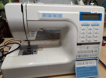 Šijací stroj v kufríku