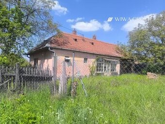 Stavebný pozemok s rodinným domom na predaj