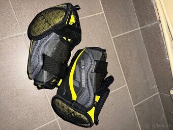 Hokejové lakťačky Bauer 1S