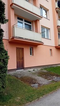 Byt s garážou a pozemkom