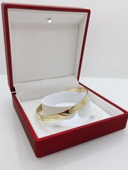 Zlatý náramok so symbolom šrouby