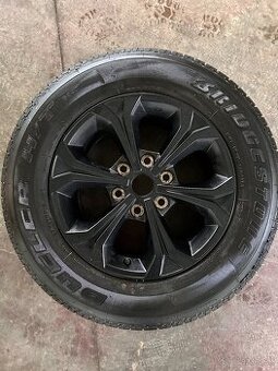 Alu disk + pneumatika Bridgestone Dueler na Mitshubishi L200