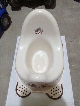 Detský šedý nočník a zelené sedátko na WC