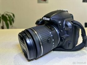 Nikon D3100 plus Nikkor AF-P 18-55mm - 1
