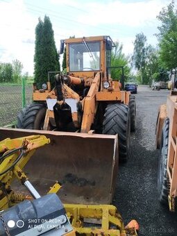 Unk 320 čelný nakladač 11 t