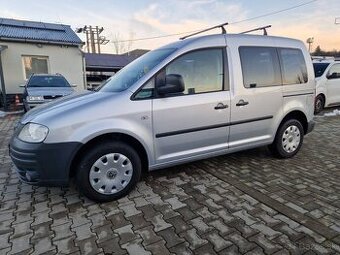 Predám Volkswagen Caddy 1.9 TDI 77 KW r.v.2009.Ohrev,7-miest