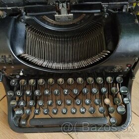 Starožitný písací stroj OLYMPIA 8