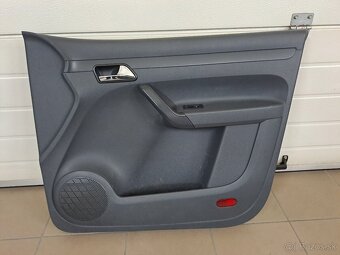 Pravý tapacir dverí VW Caddy
