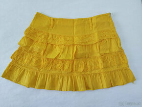 Žltá sukňa