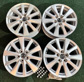 5x114,3 R17 Mazda CX originál Alu - ET 50, výborný stav
