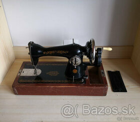 Historický prenosný šijací stroj