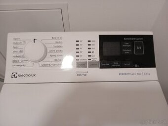 TOP STAV: Úzka zvrchu plnená práčka Electrolux EW6TN14262C