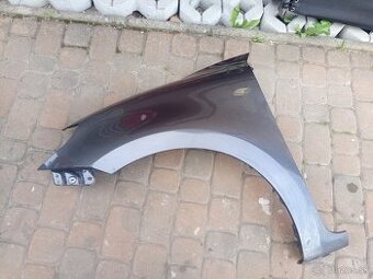 Blatník Suzuki Swift