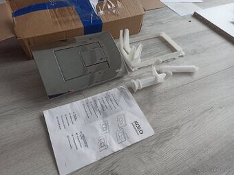 Tlačidlo kolo na wc Geberit