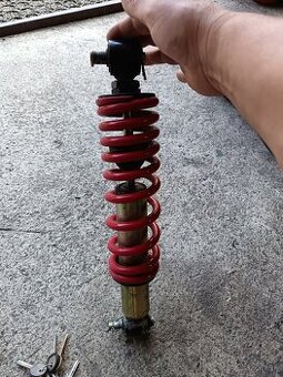 Zadný tlmič štvorkolka