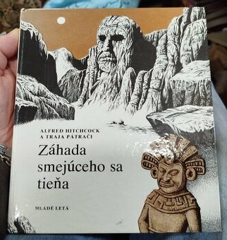 ALFRED HITCHCOCK A TRAJA PÁTRAČI--ZÁHADA SMEJÚCEHO SA TIEŇA-
