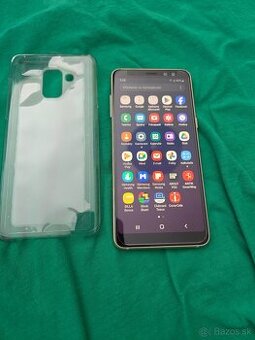 Samsung A8 2018 duos gold v peknom stave nosený v púzdre nal