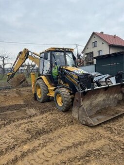 Zemné a výkopové práce s traktorbagrom caterpillar