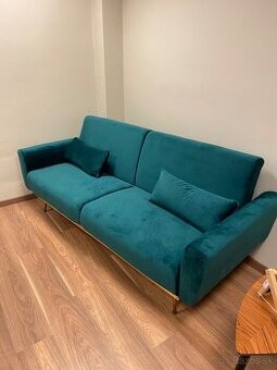 Štýlový rozkladací tmavozelený gauč