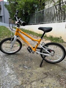 Detský bicykel WOOM 3 16" v žltej farbe a top stave