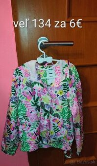 Nová prechodná bunda veľ 134