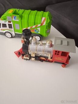 Vlakový rušeň a smetiarske auto