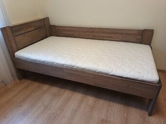 Rohová posteľ z masívu 100x200 cm