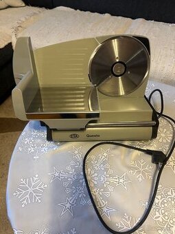 Predam krajac eletricky na chleb a salamu eta Questo