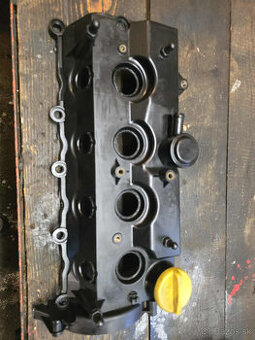 Sanie a veko hlavy na Opel