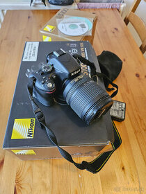 Nikon D5100 + 18-55 AF-S DX VR - 1