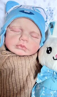 Realistická bábika Adamko