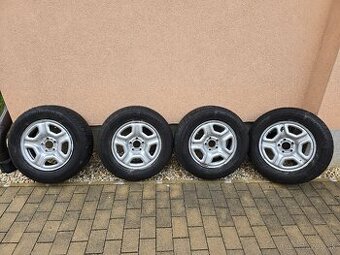Predám disky na Daciu dasyer s pneumatikami 215-65R16